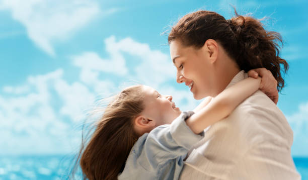 istock Happy family at nature 2111284163