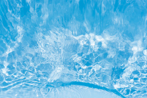 Sun reflections in pool water from sideview