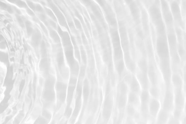 istock White water surface texture with ripples, splashes, and bubbles. Abstract summer banner background Water waves in sunlight with copy space cosmetic moisturizer micellar toner emulsion. White water. 2111310064