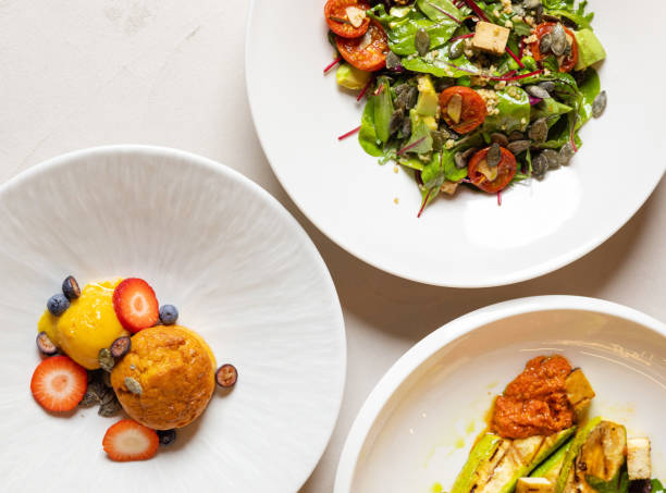 fresh salad, grilled vegetables in plate