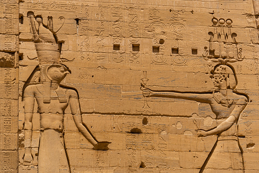 Woman walking in Temple of Philae aka Temple of Isis in Aswan Egypt,Agilkia Island
