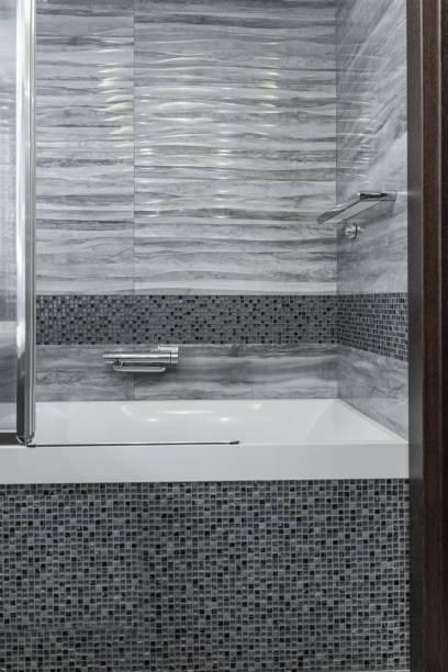 grey modern bathroom with minimalist design and tiles
