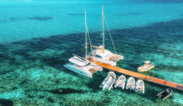 istock Aerial view boats luxure yachts dock sunset 2111426944