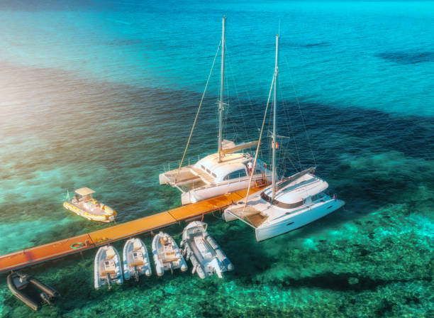 istock Aerial view boats luxure yachts dock sunset 2111442425