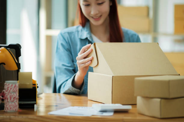 istock Small Business Owner Preparing Order for Shipment 2111449181