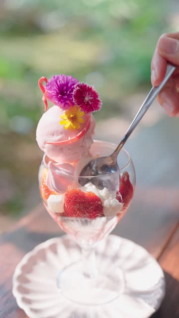 Eating gourmet ice cream with tropical flowers