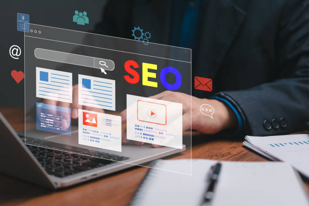 istock A man is typing on a laptop with a screen displaying a website with the words SE 2111472780