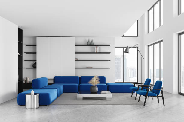 istock White home living room interior with couch and shelf near panoramic window 2111510038