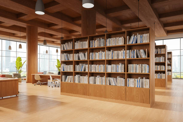 istock Wooden library interior with work and chill place, shelf and panoramic window 2111516367