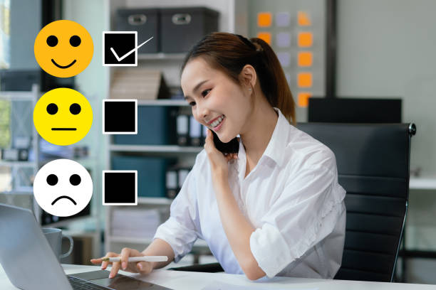 istock Happy Client customer experience concept. Woman recording phone inquiry with checkboxes, smiling face rating excellent for satisfaction survey. 2111517726