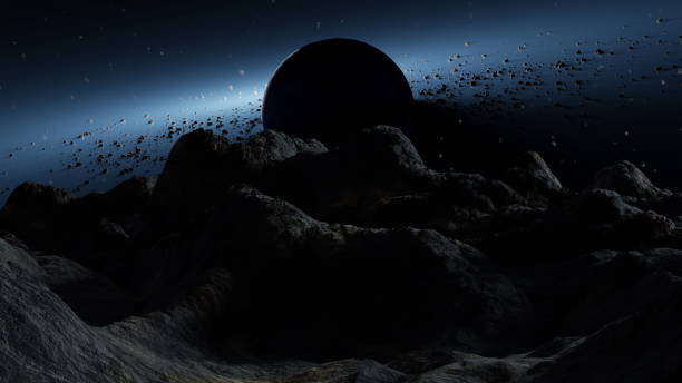 istock Otherworldly landscape features rugged terrain under a night sky, with a shadowed planet rising behind and a belt of asteroids curving across the stars. 3d render 2111545035