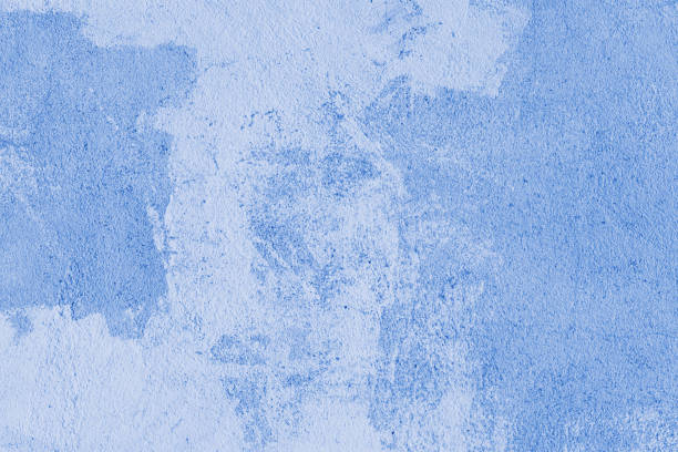 istock Stucco plaster surface, concrete wall background texture of blue painted cement 2111578731