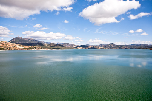 It was inaugurated on June 3, 1969, and belongs to the Guadalquivir hydrographic Confederation. The main tributary of the river Guadalquivir, the Genil, becomes Iznajar in the largest swamp in Andalusia, Cordoba province, Spain