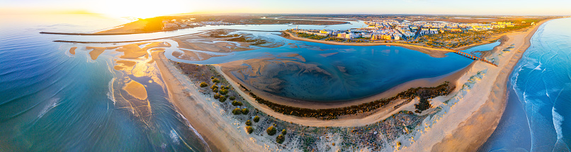 Isla Cristina drone aerial view in Huelva of Andalusia Spain at sunset skyline