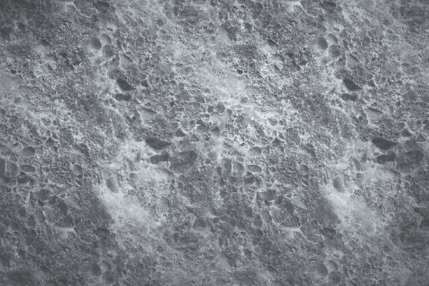 Moon surface textures background. Abstract close up view of moon surface texture on grey surface background. lunar meteorite stock pictures, royalty-free photos & images