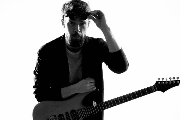 istock Male musician with guitar rock star performing entertainment program 2111608612