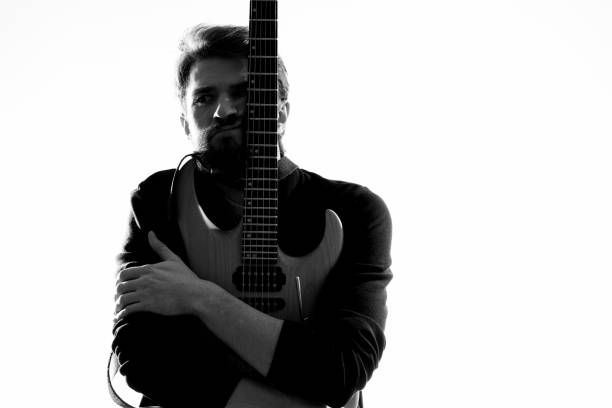 istock Male musician with guitar rock star performing entertainment program 2111610188