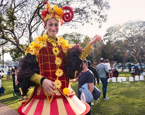 Raanana, Israel. March 24, 2024. Celebrating the Jewish holiday Purim in the city park. A man in a masquerade costume.