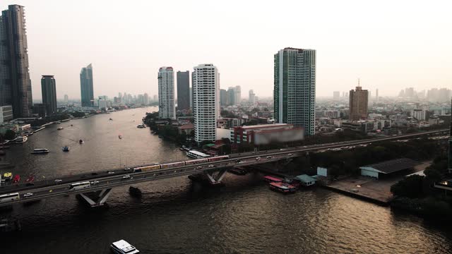 Aerial view of the metro sky train and the bridge across the river
