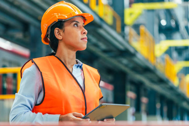 istock In this compelling stock photo, an engineer is captured in the dynamic environment of a train and railway garage, immersed in the meticulous tasks of maintenance 2111664749