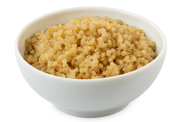 istock Cooked white quinoa in a white ceramic bowl isolated on white. 2111742773