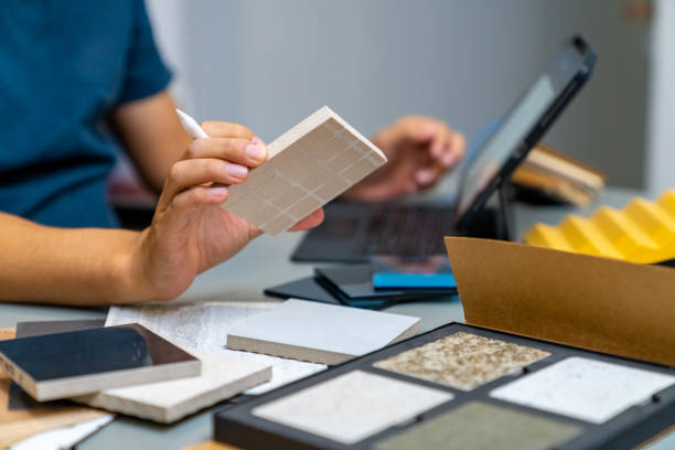 istock Asian man home interior designer working in office 2111814379