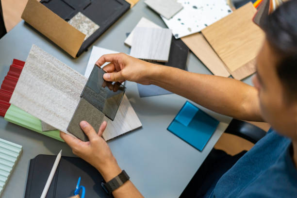 istock Asian man home interior designer working in office 2111816080