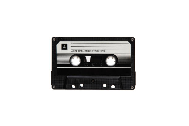 Close-up of an audio cassette with a sticker without text.  Analog storage medium. Cassettes for audio recordings and music.