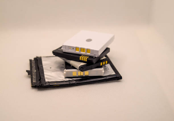 Stack of phone batteries on top of each other isolated