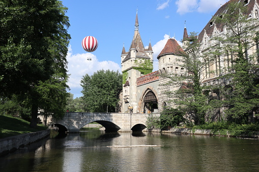 Hot air balloon flying near Vajdahunyad Castle, Budapest, Hungary.
