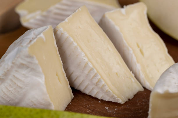 istock delicious fresh soft cheese with white mold 2111880588