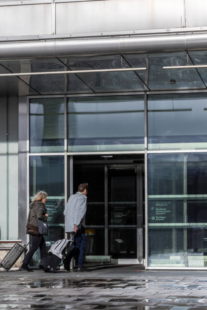 Stockholm, Sweden Stockholm, Sweden March 17, 2024 Passengers entering Terminal 5 at Arlanda airport. walking into glass door stock pictures, royalty-free photos & images