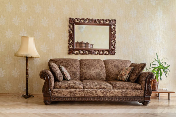 istock bright retro style living room with vintage sofa and mirror 2112013062