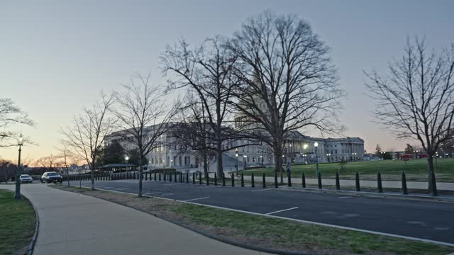 Push in video of The United States Capitol Building at sunset in Capitol Hill, Washington, D.C.,