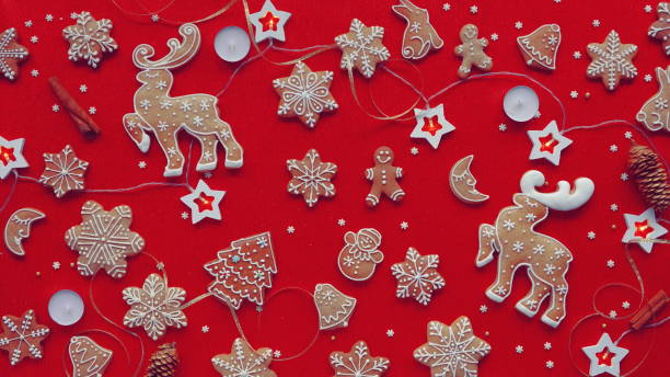 istock Holiday Gingerbread Cookies Decorations Red Fabric Background Top View Christmas Setup 2112064383