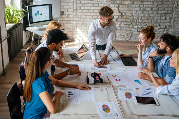 istock Entrepreneurs designers architects business people conference in office 2112081537