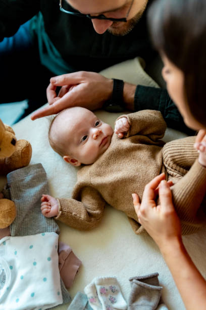 istock Care, support and wake up with parents and baby boy 2112092548