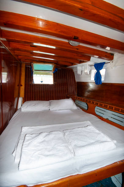istock Wooden yacht interior, yacht cabin 2112093085