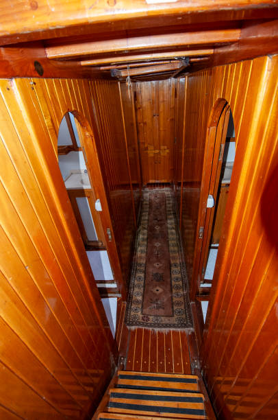istock Wooden yacht corridor 2112102375