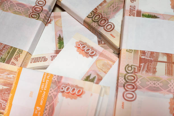 istock Russian money, five thousand bills close-up, business concept. Selective focus, blur. 2112149964