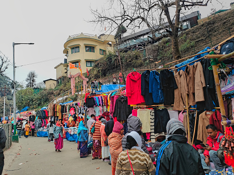 Darjeeling West Bengal India 19.03.2024.tourists visiting the local street market at afternoon in Darjeeling Mahakal Market India