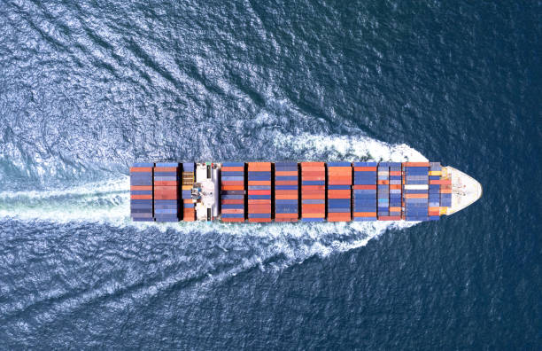 istock Aerial top view container ship full load container for logistics import export, shipping or transportation concept background. shipyard at sunrise, logistic import export and transport industry background 2112209686