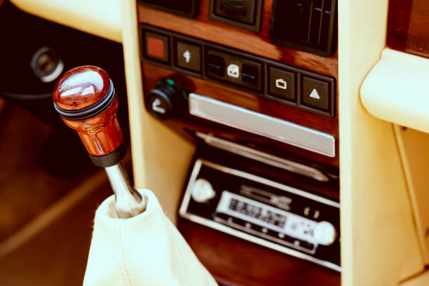 Luxurious car equipment in an elegant and old fashion style. Old car stereo radio.