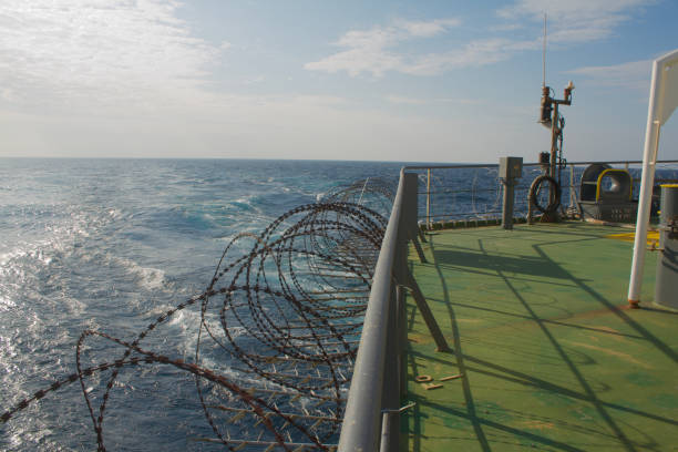 istock Vessel hardening is done with razor wire and wire fencing 2112221401