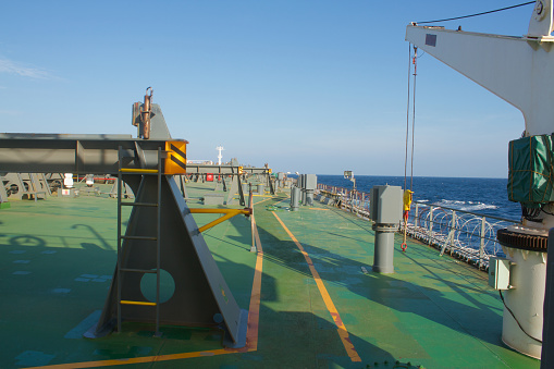 View of the vessel hardening on board a merchant ship using razor wire to stop pirates from boarding the ship. These ship protection measures are employed when the ship passes through high risk areas.