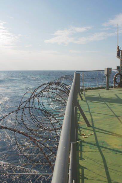 istock Vessel hardening is done with razor wire and wire fencing 2112221412