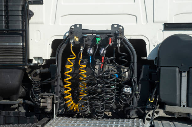 istock Pneumatic and electrical hoses and cables connecting truck and trailer 2112248768