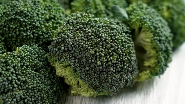 Organic raw broccoli. Green raw cruciferous vegetables. Healthy lifestyle concept. Rotation