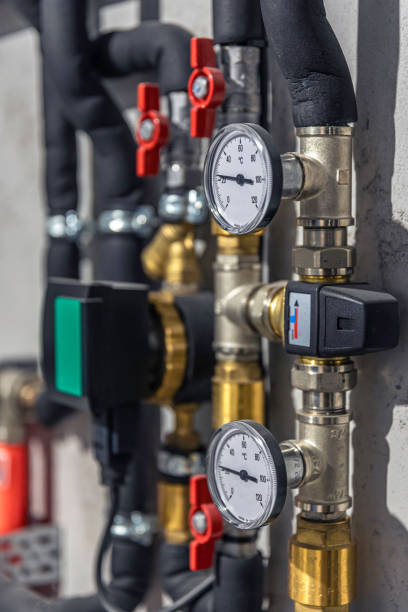 istock Pressure sensor on the hot water pressure reducing valve. 2112258380