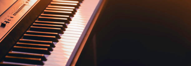 istock Musical background with piano keys and space for a text. 2112274982